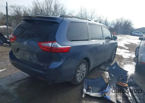 2015 Toyota Sienna Xle 7 Passenger z USA, uszkodzony, nr VIN 5TDDK3DC2FS118896
